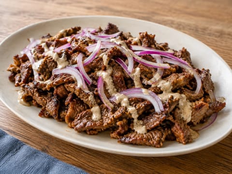 Rundershawarma met yoghurtmarinade en tahinsaus Rundershawarma met yoghurtmarinade en tahinsaus