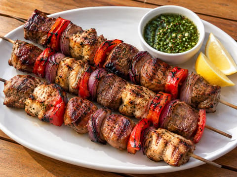 Asado Mixto (Mixed Grill with Chimichurri, Peppers and Onion) Asado Mixto (Mixed Grill with Chimichurri, Peppers and Onion)