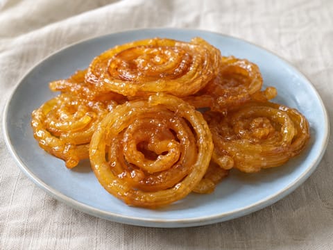 Jalebi (fermentiertes Spiralgebäck in Sirup)