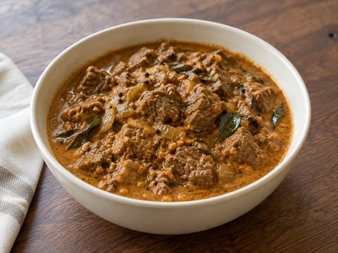 Malabar-biffcurry med kokos og karriblader Malabar-biffcurry med kokos og karriblader
