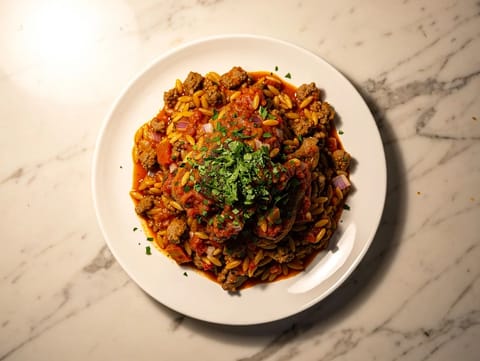 Lammragù med orzo och varma kryddor Lammragù med orzo och varma kryddor