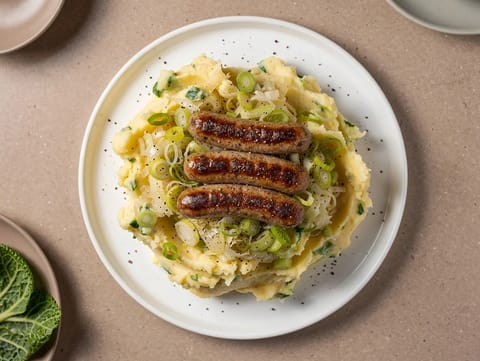 Pølser med svinekjøtt og purre med colcannon Pølser med svinekjøtt og purre med colcannon