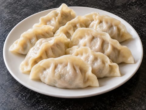 Kinesiske nyttårsdumplings (svinekjøtt og kinakål) Kinesiske nyttårsdumplings (svinekjøtt og kinakål)